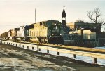 Loaded coal train rolls east